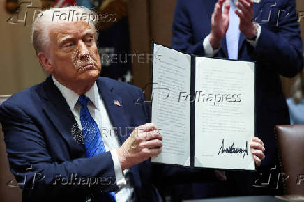 FILE PHOTO: U.S. President Trump delivers remarks at the White House, in Washington