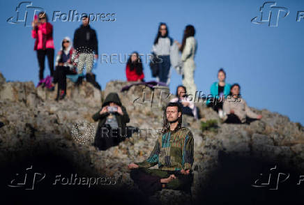 People celebrate the summer solstice at the Kokino megalithic observatory, near the city of Kumanovo
