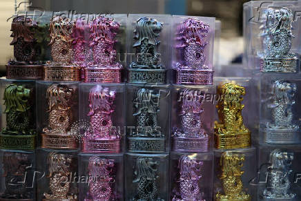 Merlion statues are displayed for sale at Chinatown in Singapore