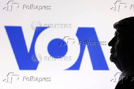 FILE PHOTO: Illustration shows 3D-printed miniature model of U.S. President Trump and Voice of America (VOA) logo
