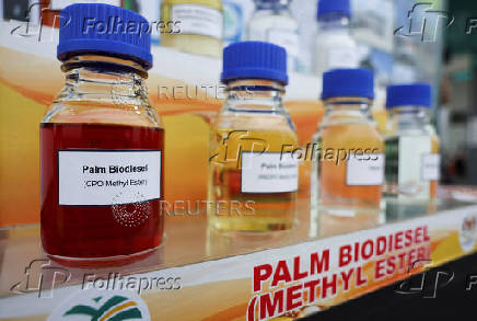 Bottles of palm biodiesel are displayed at Sepang