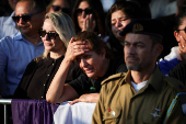 People mourn Israeli soldier Staff Sergeant Lior Steinberg, in Petah Tikva