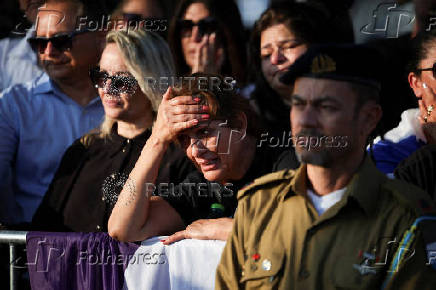 People mourn Israeli soldier Staff Sergeant Lior Steinberg, in Petah Tikva