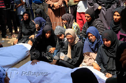 Mourners attend the funeral of Palestinians killed in what the Gaza Health Ministry said were Israeli airstrikes, in Khan Younis