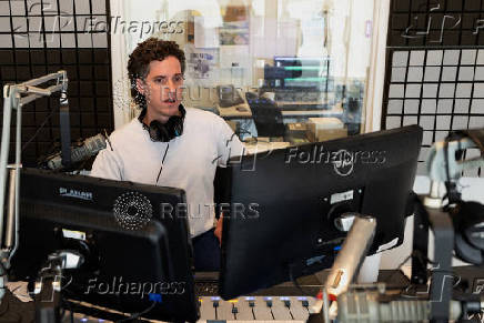 News Director Travis Bubenik broadcasts a live news segment over the Marfa Public Radio in Marfa