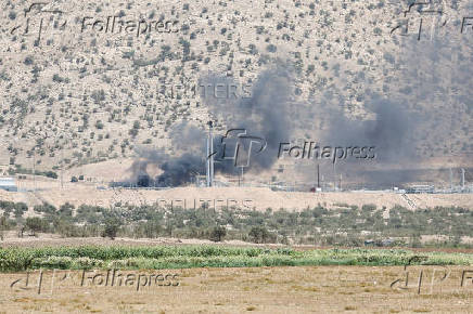 Smoke rises after a drone attack targeted oil facilities in the Zakho area of Iraq's Kurdistan region