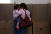 People vote at a pre-polling centre in Sydney