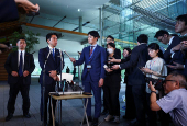 Japan's incoming Agriculture, Forestry and Fisheries Minister Shinjiro Koizumi speaks to media in Tokyo