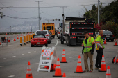 Cars sit in traffic on Pacific Coast Highway, in Los Angeles