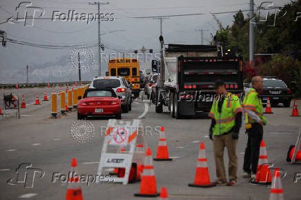 Cars sit in traffic on Pacific Coast Highway, in Los Angeles
