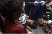 Palestinian children injured in Israeli airstrike on displaced persons' tent in Khan Yunis