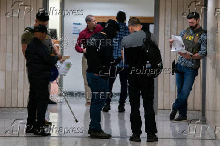 U.S. federal immigration officers operate at immigration court in New York