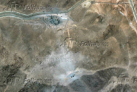 A satellite overview shows earthmoving at the Fordow Fuel Enrichment Facility, , following U.S. airstrikes amid the Iran-Israel conflict, near Qom