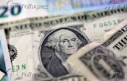 Illustration shows U.S. dollar banknotes