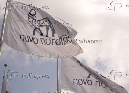 Novo Nordisk flags flutter outside their office in Bagsvaerd, on the outskirts of Copenhagen