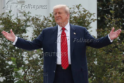 U.S. President Trump and architect McCrery on a walk on the roof of the White House in Washington