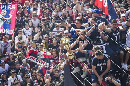 Players of Bologna FC and fans celebrate in Bologna