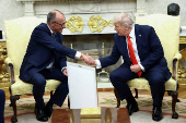 FILE PHOTO: German Chancellor Friedrich Merz visits the U.S.