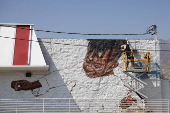 Artist works on new mural for the Altadena community in the months following the Eaton fire