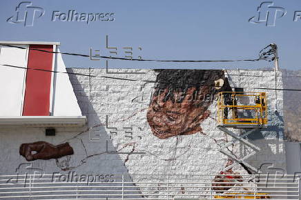 Artist works on new mural for the Altadena community in the months following the Eaton fire