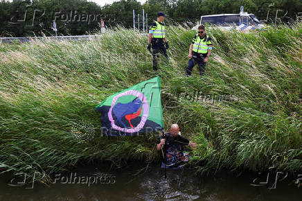 Extinction Rebellion activists block Dutch highway A44 ahead of the NATO summit at The Hague, near Abbenes