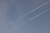 Missiles launched from Iran are seen over Jerusalem amid the Iran-Israel conflict