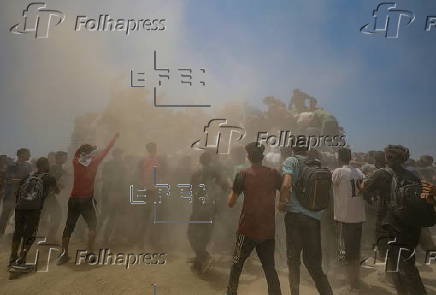 Aid enters Gaza Strip after Israel announces daily pause of hostilities