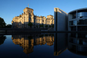 Sunlight illuminates the Reichstag building, the seat of the German parliament, in Berlin