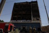 Overnight fire at a shopping center kills dozens of people, in al-Kut