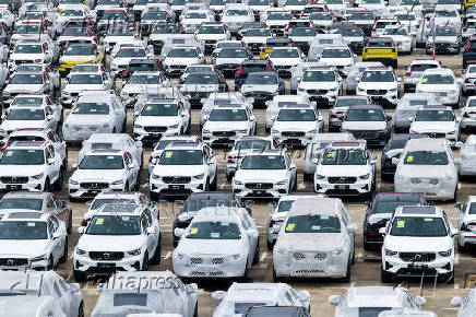 FILE PHOTO: Cars for export sit at a port in Nanjing