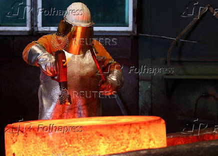 FILE PHOTO: Steel workers at Dirostahl in Remscheid
