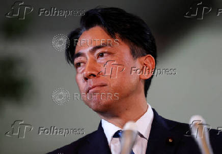 FILE PHOTO: Japan's incoming Agriculture, Forestry and Fisheries Minister Shinjiro Koizumi makes appearance before the media in Tokyo