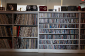 A library of vinyl records and CDs lines the shelves at the Marfa Public Radio station in Marfa