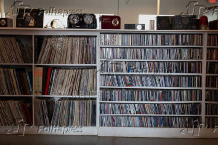 A library of vinyl records and CDs lines the shelves at the Marfa Public Radio station in Marfa
