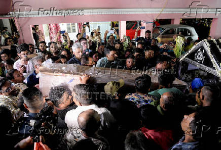 FILE PHOTO: A coffin with the body of Bitan Adhikary, who was killed in a suspected militant attack near Pahalgam, is carried at his residence before his funeral, in Kolkata