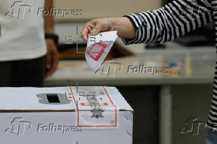 Voters cast their ballots in recall election for several Taiwanese legislators