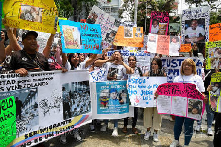 Family members of migrants imprisoned in El Salvador protest in Caracas