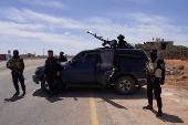 Syrian security forces deployed in the village of Al-Soura al-Kubra