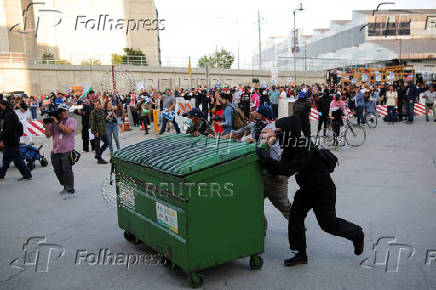 Protesters gather around the Los Angeles Federal Building after multiple detentions by ICE, in Los Angeles