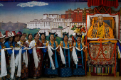 Tibetans mark the 90th birthday celebration of their spiritual leader, the Dalai Lama, at Jawalakhel Handicraft Center in Lalitpur