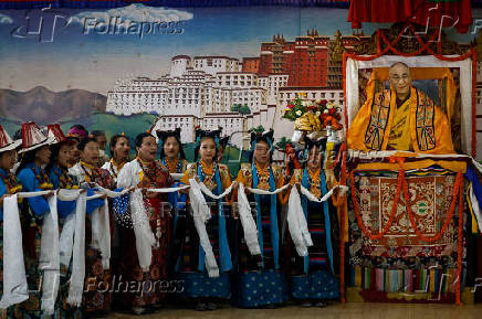 Tibetans mark the 90th birthday celebration of their spiritual leader, the Dalai Lama, at Jawalakhel Handicraft Center in Lalitpur