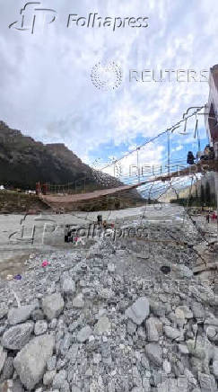 Aftermath of a suspension bridge collapse in Yili, Xinjiang Uyghur Autonomous Region