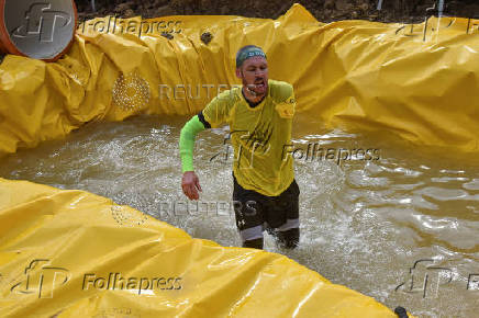 Ukrainian war veteran attends a race with obstacles in Vynnyky, ouside of Lviv