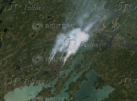Smoke rises from wildfires in Manitoba