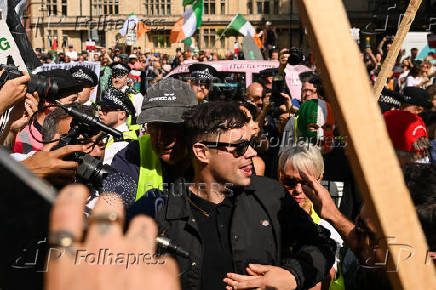 Member of Irish rap group Kneecap in UK court on terrorism charge