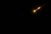 Missiles launched from Iran towards Israel are seen from Hebron
