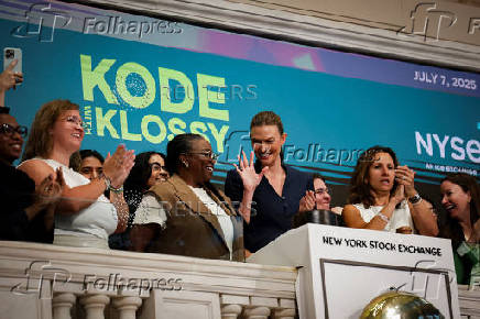 Chief Executive Officer Osi Imeokparia and model and founder Karlie Kloss of Kode With Klossy ring the opening bell at the New York Stock Exchange (NYSE) in New York City