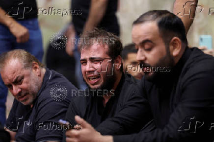 Funeral of the victims of a shopping center fire in al-Kut, in Najaf