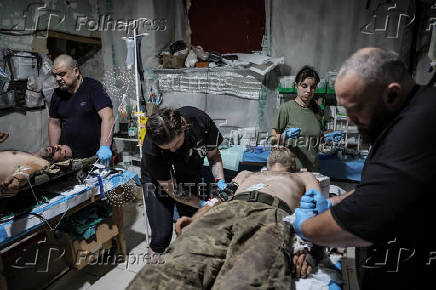 Ukrainian Armed Forces combat medics treat injured servicemen near Chasiv Yar