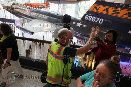 Smithsonian's National Air and Space Museum reopens its Mall entrance and several galleries to the public in Washington